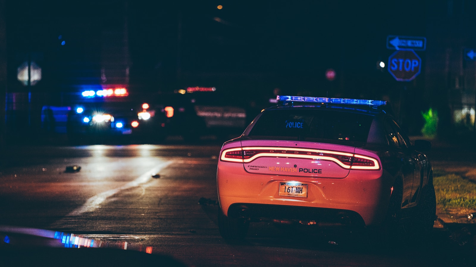 A police car parked on the side of the road